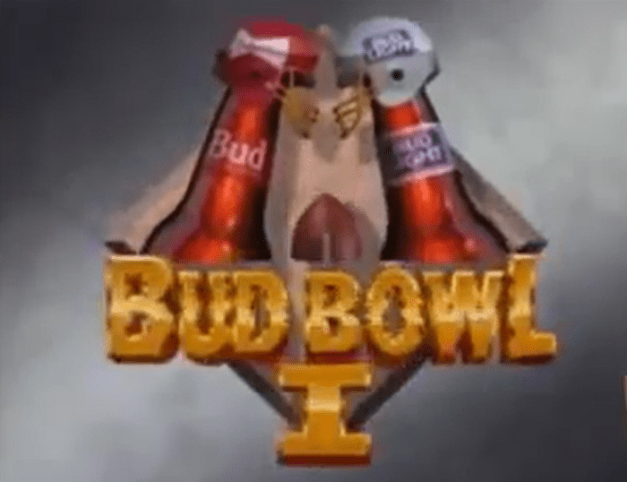 Bub Bowl 1 logo featuring 2 beer bottles placed neck to neck with a Budweiser American football helmet and a bud light American football helmet.